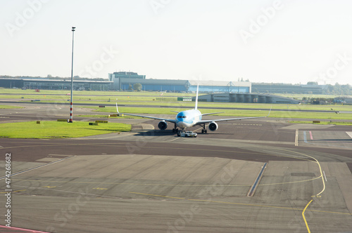 Commercial airplane on the runway ready for take off on Schiphol in the Netherlands