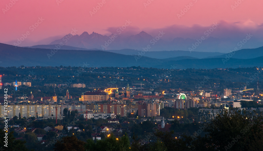 Evening distant Krakow panorama with Tatra mountains in the background