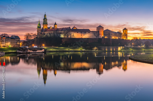 Wawel Castle and Wawel cathedral seen from the Vistula boulevards in the morning © tomeyk