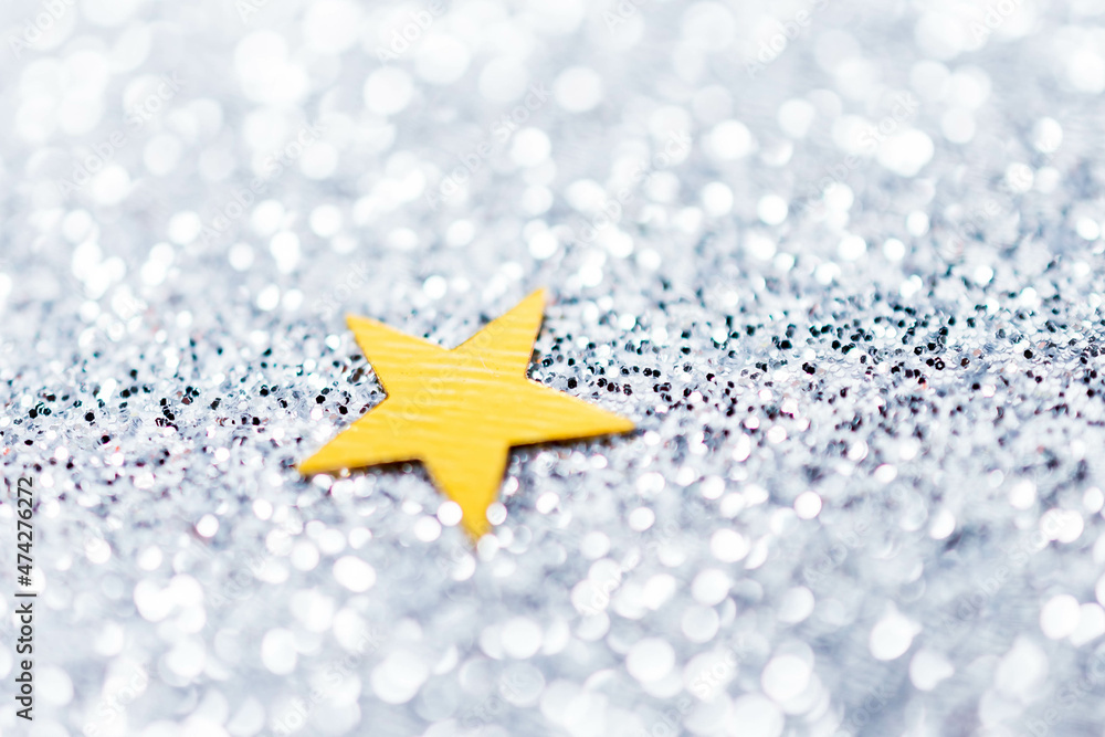 Bright silver lights sparkling background with star. Chrismas background