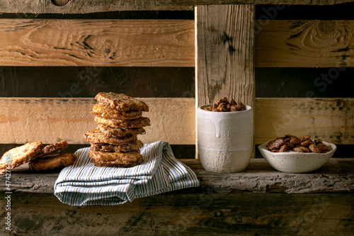 Sweet homemade snacks roasted almond nuts and shortbread cookies