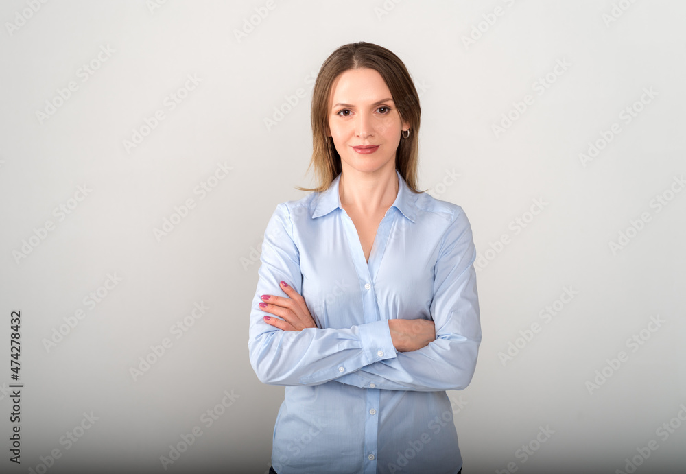 Close up beautiful young business woman with crossed arms Close up beautiful young business woman with crossed arms