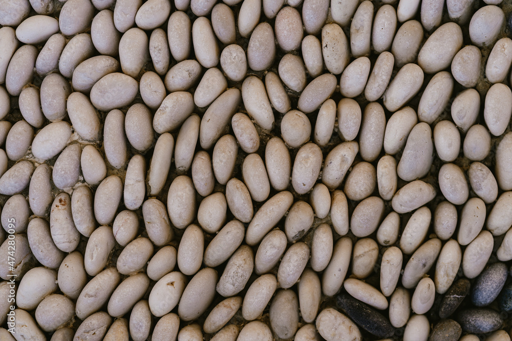 Abstract Rocks or smooth rocks and stones with light beige texture Abstract Rocks or smooth rocks and stones with light beige texture