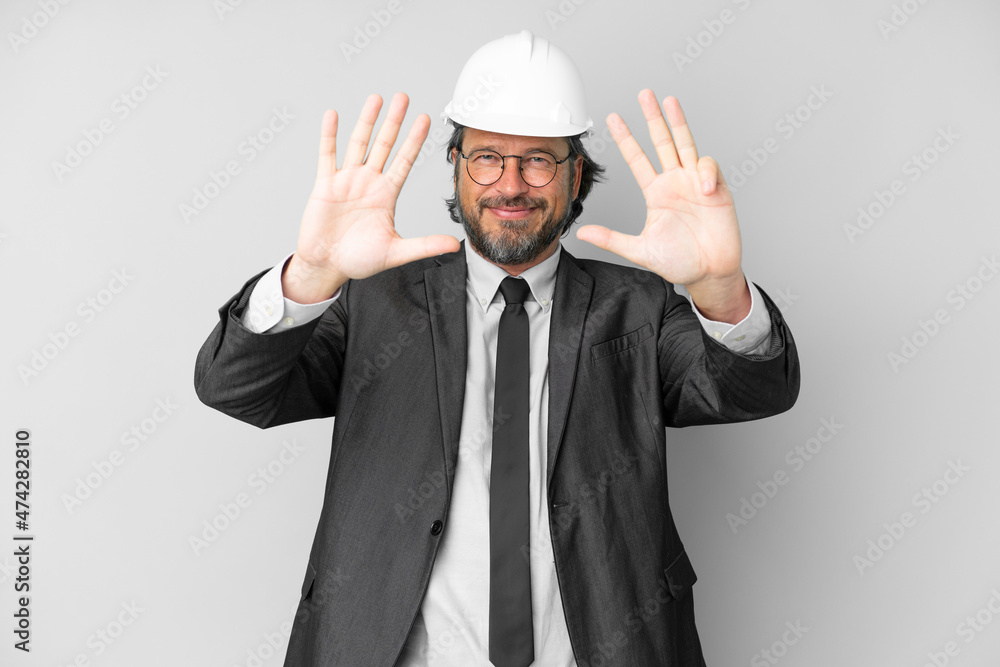 Young architect man with helmet over isolated background counting nine with fingers Young architect man with helmet over isolated background counting nine with fingers