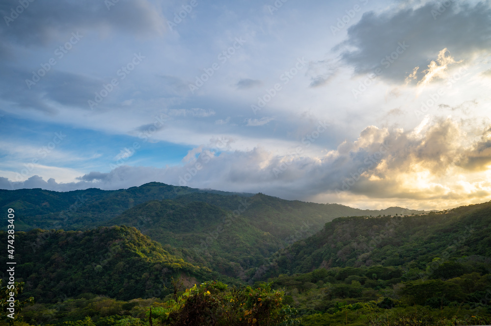 Sunset light across the mountains in Costa Rica, just outside of San Jose.
