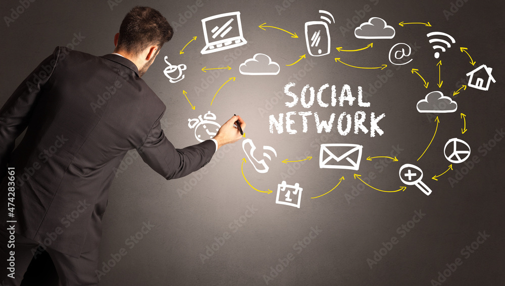 businessman drawing social media icons businessman drawing social media icons