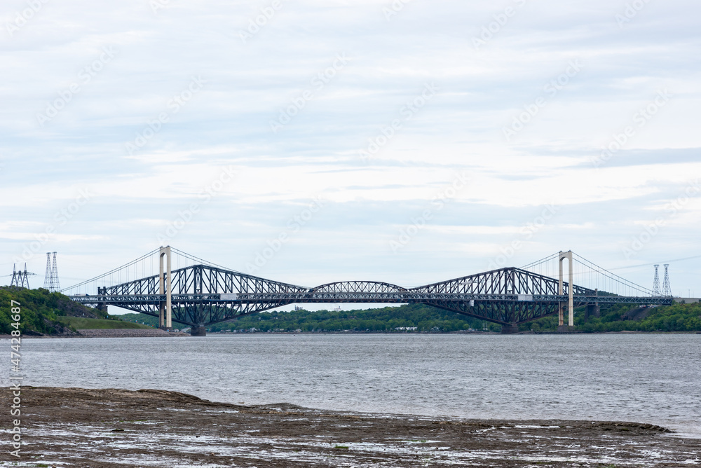 The two Quebec city bridge (Quebec bridge and Pierre-Laporte bridge) view from the north shore of the St Lawrence river in the district of Cap-Rouge Sainte-Foy.