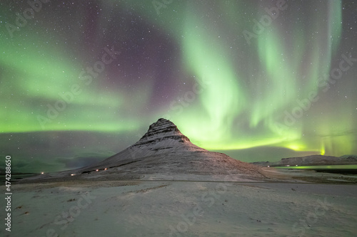 Northern lights (aurora borealis) over Kirkjufell, Snaefellsnes Peninsula, Iceland