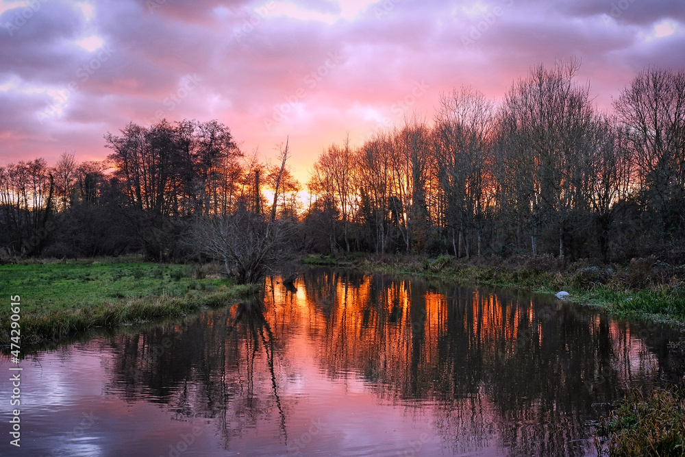 Winter sunset over the River Wey in Godalming, Surrey, UK