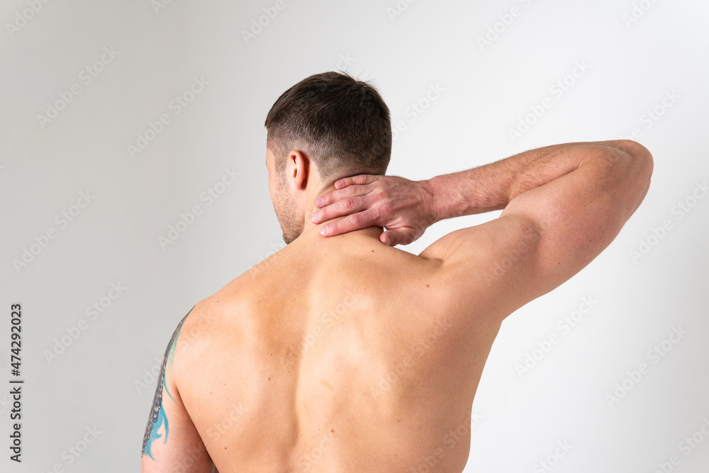 The muscles of the neck in a man on a white background are hurt pain hurt injury, cramp sick man young medical, illness chronic. Touching red care, lower suffer attractive The muscles of the neck in a man on a white background are hurt pain hurt injury, cramp sick man young medical, illness chronic. Touching red care, lower suffer attractive