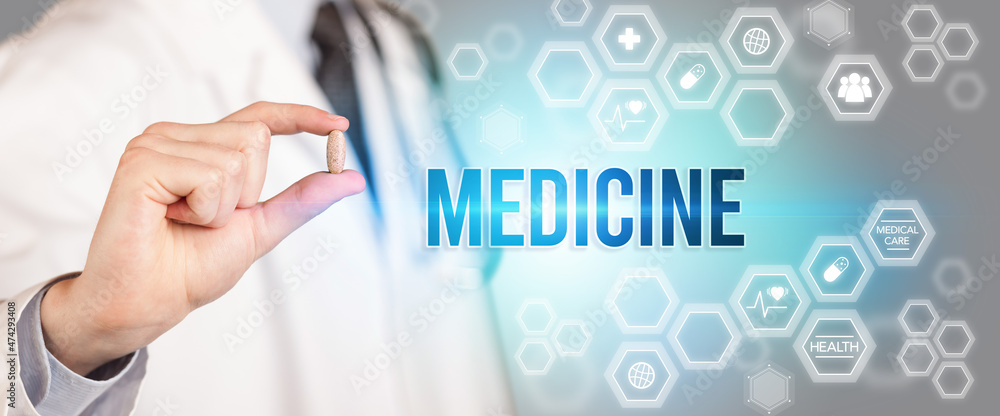 Close-up of a doctor giving you a pill Close-up of a doctor giving you a pill