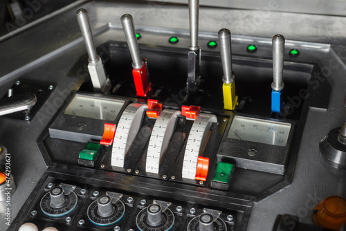 Futuristic spaceship abstract technological control panel with toggle switches and buttons or panel of unknown device or space ship