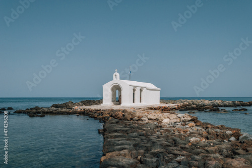 Agios Nikolaos Church, whitewashed chapel in sea, Georgioupoli