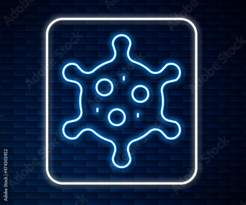 Glowing neon line Virus icon isolated on brick wall background. Corona virus 2019-nCoV. Bacteria and germs, cell cancer, microbe, fungi. Vector
