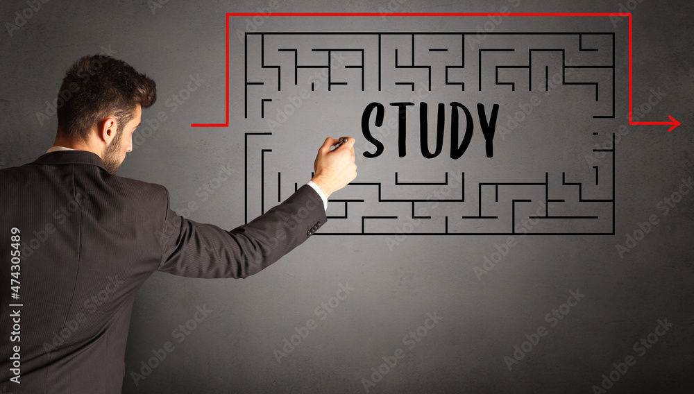 businessman drawing maze concept businessman drawing maze concept