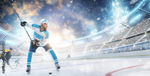 Sport. High concentration. Professional hockey player ready to attack in ice. Sports emotions. Concept of action, team sport game, ad