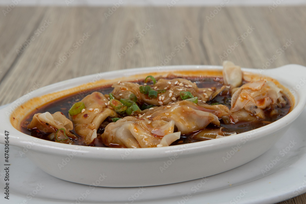 Szechwon flavored wontons soaking in this favorite flavor of Chines cuisine Szechwon flavored wontons soaking in this favorite flavor of Chines cuisine