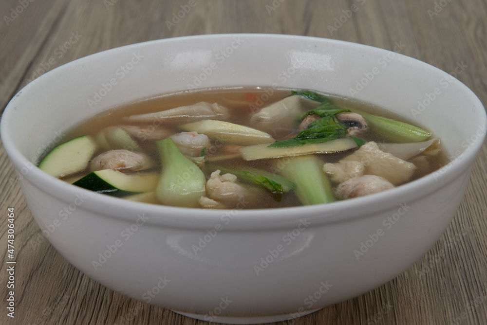 Hot bowl of freshly made wonton soup with large chunky ingredients for a very hearty Chinese meal Hot bowl of freshly made wonton soup with large chunky ingredients for a very hearty Chinese meal