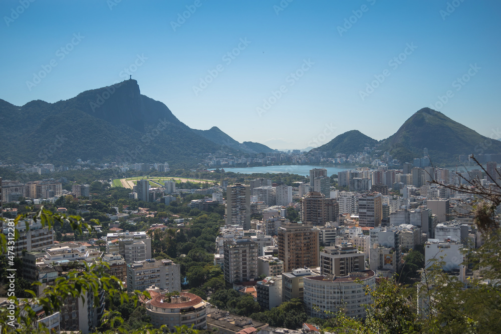 Rio de Janeiro, Brazil, August 2019 - view of Rodrigo de Freitas Lagoon and Christ the Redeemer statue in the background from a viewpoint at  Parque Penhasco Dois Irmãos (Two Brothers Hill)