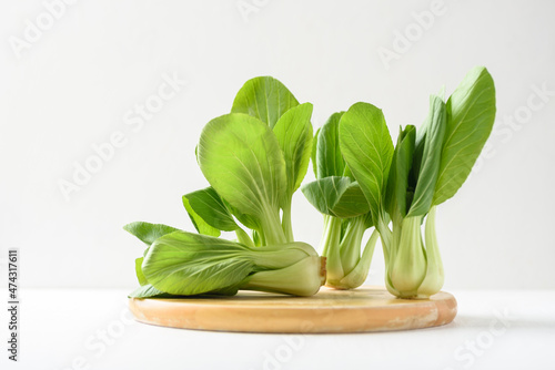 Obraz na plátně Bok choi (white cabbage) on a white background Ingredients in Asian Vegetarian a