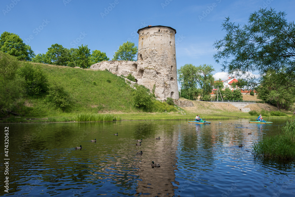 Sunny July day at the ancient Gremyachaya Tower. Pskov, Russia