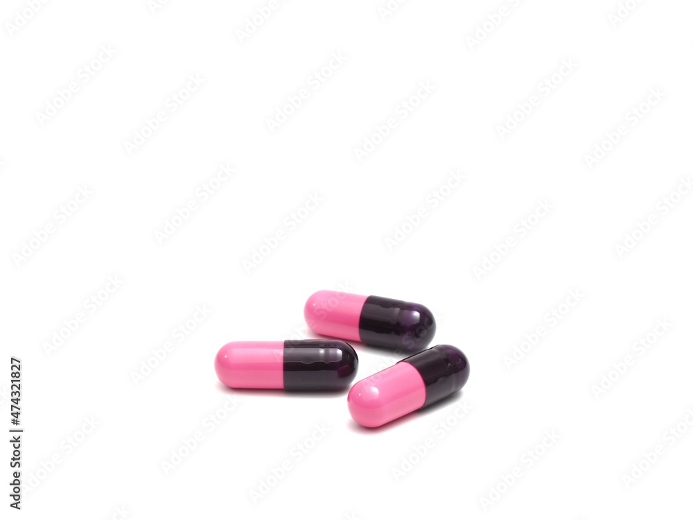 photograph of capsule pills on a white background photograph of capsule pills on a white background