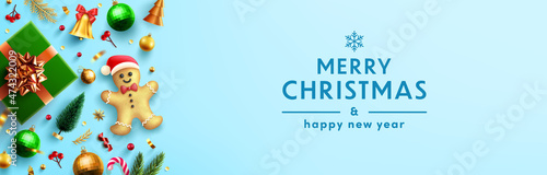Merry Christmas and Happy New Year Poster or banner with gingerbread men,gift box and christmas element.Banner template for Retail,Shopping,New year or Christmas Promotion.