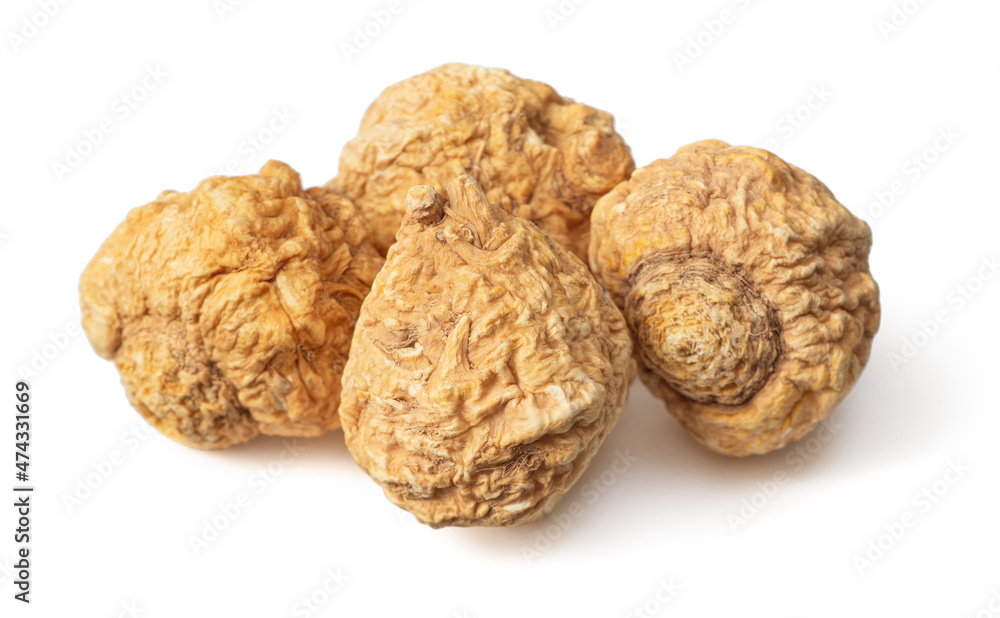 Dried yellow Maca roots isolated on white background Dried yellow Maca roots isolated on white background