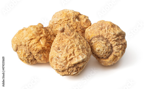 Dried yellow Maca roots isolated on white background