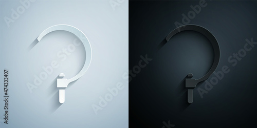 Paper cut Sickle icon isolated on grey and black background. Reaping hook sign. Paper art style. Vector