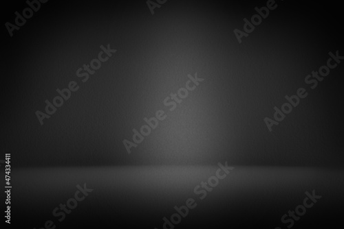 Black wall studio room and gradient texture concrete with a spotlight for background. Abstract black and white gradient background for Copy, space, text, wording, graphic, and Product showcase ideas