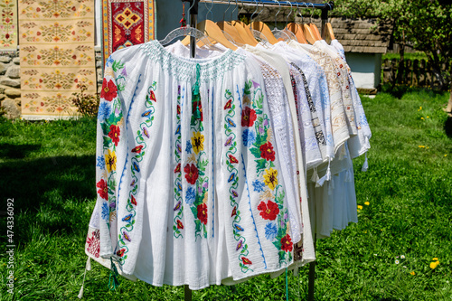 Traditional Romanian hand made clothes displayed for sale at a hand made festival in Bucharest, Romania.