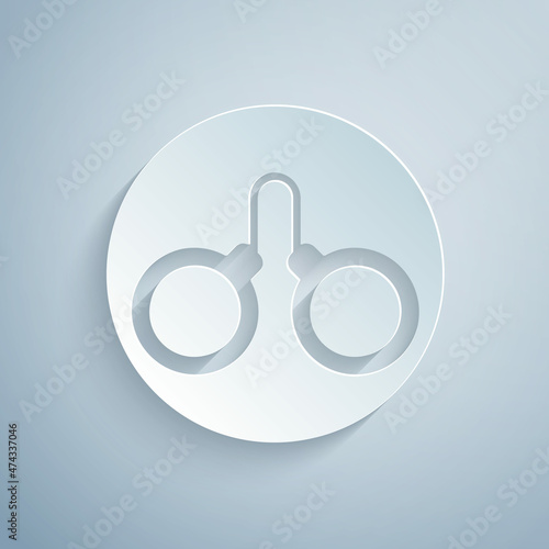 Paper cut Handcuffs icon isolated on grey background. Paper art style. Vector