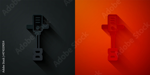 Paper cut Electrical hand concrete mixer icon isolated on black and red background. Handheld electric cement mixer. Paper art style. Vector