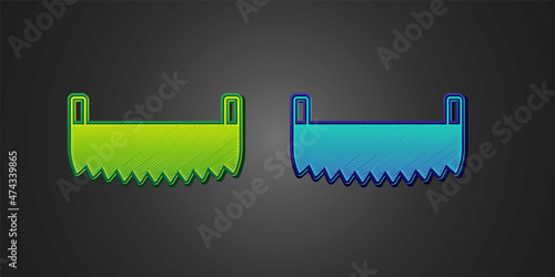 Green and blue Two-handed saw icon isolated on black background. Vector