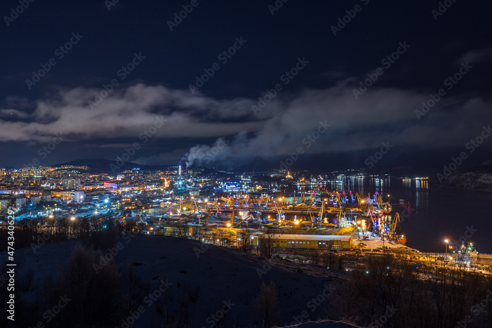 Night view from the hill to the port of Murmansk. Murmansk, Russia.