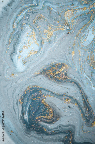 Natural luxury. Tiffany blue. Abstract ocean- ART. Style incorporates the swirls of marble or the ripples of agate. Very beautiful blue paint with the addition of gold powder.   © CARACOLLA