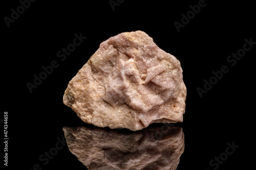 macro mineral stone Hackmanite on a black background