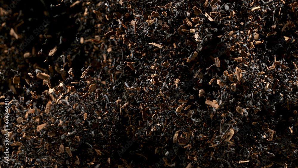 Freeze Motion Shot of Exploding Dry Tea Leaves. Top shot. Freeze Motion Shot of Exploding Dry Tea Leaves. Top shot.