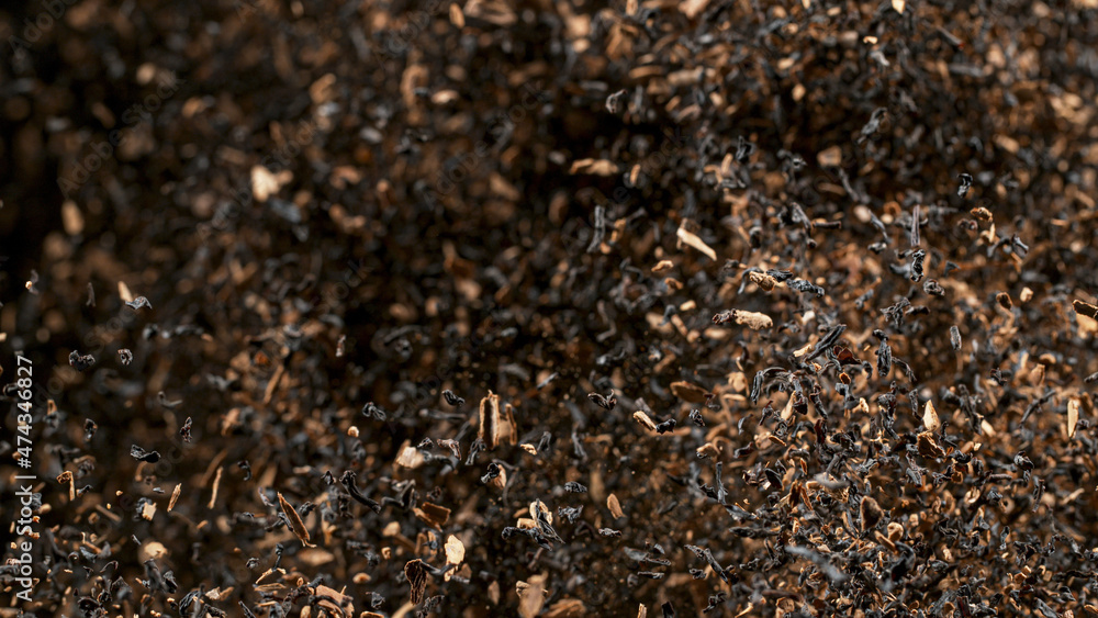 Freeze Motion Shot of Exploding Dry Tea Leaves. Top shot. Freeze Motion Shot of Exploding Dry Tea Leaves. Top shot.