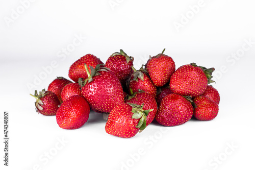 Sweet ripe strawberry on white background. Summer berries close up image.