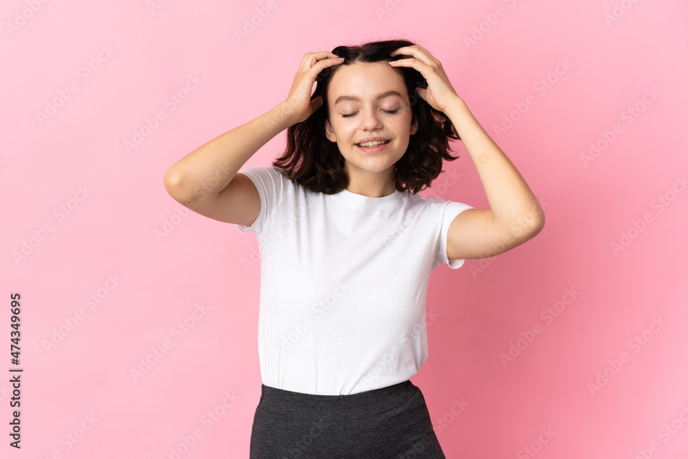 Teenager Ukrainian girl isolated on pink background laughing Teenager Ukrainian girl isolated on pink background laughing