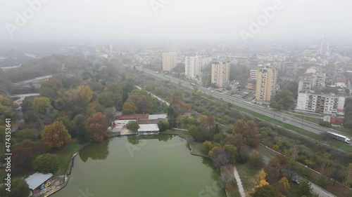 Amazing Aerial view of town of Pazardzhik, covered with fog,  Bulgaria photo