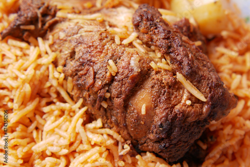  mutton biryani meal in a plate on table.