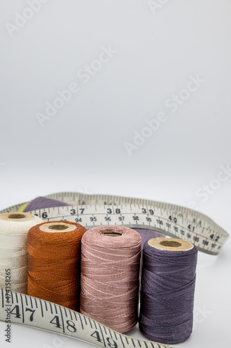 Stitching Material, Measurement Type, Thread Coan, Buttons.   photo