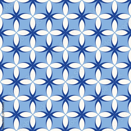 Blue-white abstract pattern as a background for printing..Regular seamless pattern with different shapes. Repeating texture.
