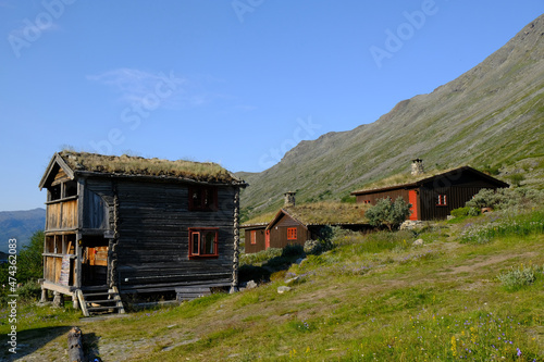 Traditional wooden turf houses in the Norwegian mountains. Spiterstulen - Norwegian tourist hostel located in Jotunheimen Mountains, in Visdalen valley, on Visa River. Jotunheimen National Park