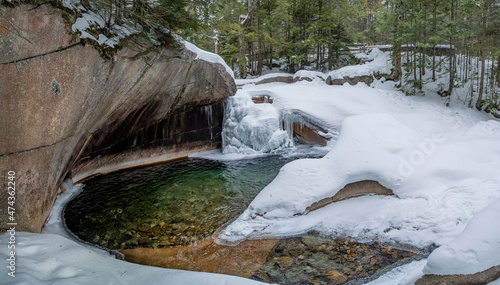 The Basin in Franconia Notch State Park during winter . New Hampshire mountains. USA