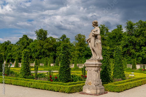 beautiful royal garden of  Willanow Palace in english style with antique statues Warsaw Poland