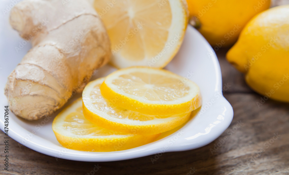 Lemon and ginger slices ready to make delicious hot tea. Lemon and ginger slices ready to make delicious hot tea.